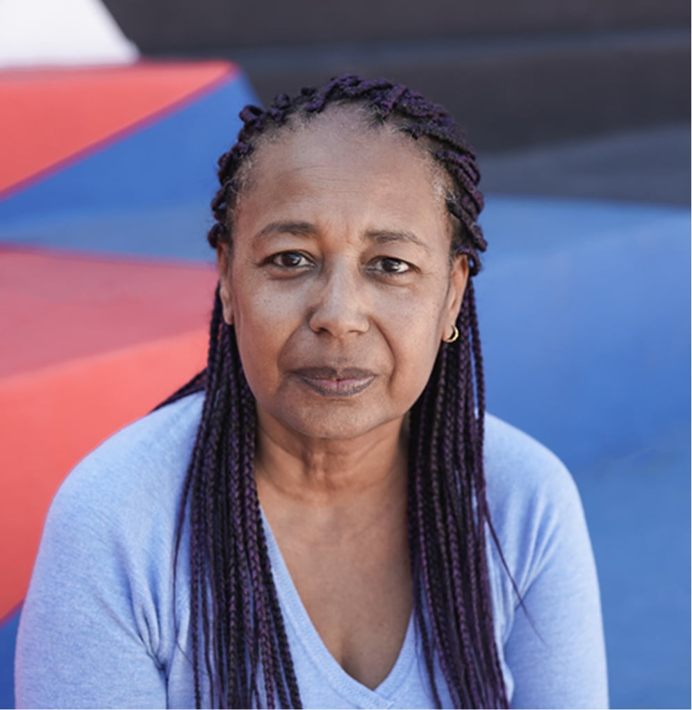 Hero-image1 - Portage Path Behavioral Health A woman with a serene expression, conveying hope and resilience.